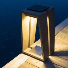 Load image into Gallery viewer, Skaal Outdoor Solar LED Lantern in Outside Area.
