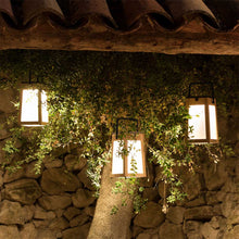 Load image into Gallery viewer, Tecka Outdoor Solar LED Lantern in Outside Area.
