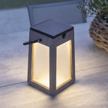 Load image into Gallery viewer, Tecka Outdoor Solar LED Lantern in Outside Area.
