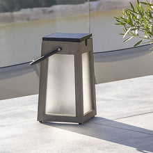 Load image into Gallery viewer, Tecka Outdoor Solar LED Lantern in Outside Area.
