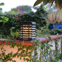 Load image into Gallery viewer, Tekura Outdoor Solar LED Table Lamp in Outside Area.
