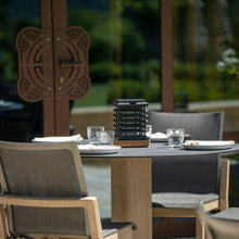 Load image into Gallery viewer, Tekura Outdoor Solar LED Table Lamp in room.
