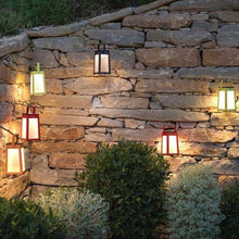 Load image into Gallery viewer, Tinka Outdoor Solar LED Lantern in Outside Area.
