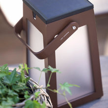 Load image into Gallery viewer, Tinka Outdoor Solar LED Lantern in Outside Area.
