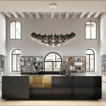 Load image into Gallery viewer, Random Cloud LED Pendant Light in office.
