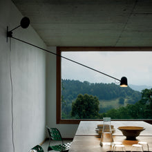 Load image into Gallery viewer, Counterbalance LED Wall Light in living room.
