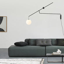 Load image into Gallery viewer, Malamata Wall Light in living room.
