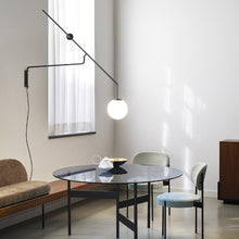Load image into Gallery viewer, Malamata Wall Light in living room.
