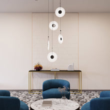 Load image into Gallery viewer, Meclisse™ Multi Light LED Pendant Light in living room.
