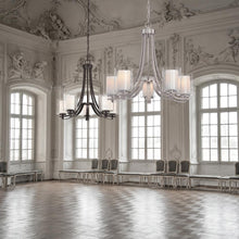 Load image into Gallery viewer, Parsons Studio Chandelier in living room.
