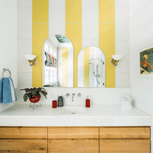 Load image into Gallery viewer, Kelsey Wall Light in bathroom.
