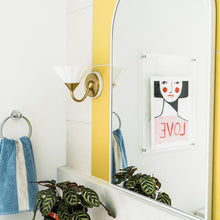 Load image into Gallery viewer, Kelsey Wall Light in bathroom.
