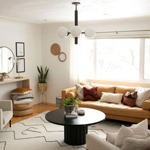 Load image into Gallery viewer, Stella Chandelier in living room.
