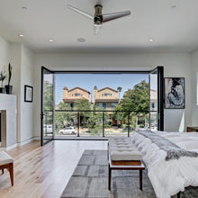 Load image into Gallery viewer, Velo DC Flush Mount Ceiling Fan in bedroom.
