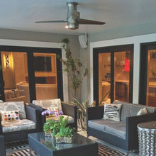 Load image into Gallery viewer, Velo DC Flush Mount Ceiling Fan in living room.
