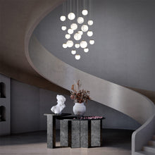 Load image into Gallery viewer, Pisces LED Chandelier in living room.
