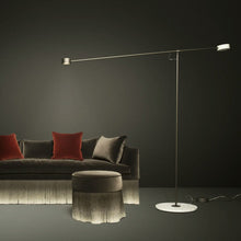 Load image into Gallery viewer, T LED Floor Lamp in living room.
