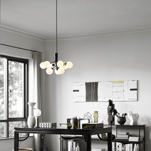 Load image into Gallery viewer, Apiales Chandelier in living room.
