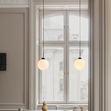 Load image into Gallery viewer, Apiales Pendant Light in living room.

