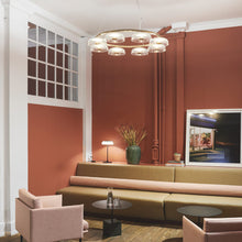 Load image into Gallery viewer, Blossi LED Chandelier in living room.
