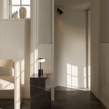 Load image into Gallery viewer, Blossi LED Mini Portable Table Lamp in living room.

