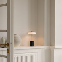 Load image into Gallery viewer, Blossi LED Mini Portable Table Lamp in living room.
