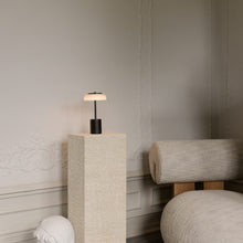 Load image into Gallery viewer, Blossi LED Mini Portable Table Lamp in living room.
