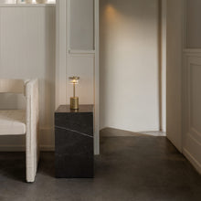 Load image into Gallery viewer, Blossi LED Mini Portable Table Lamp in living room.
