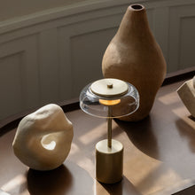 Load image into Gallery viewer, Blossi LED Mini Portable Table Lamp in living room.
