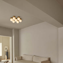 Load image into Gallery viewer, Liila Star Ceiling / Wall Light in living room.
