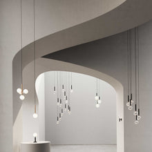 Load image into Gallery viewer, Miira Chandelier in living room.
