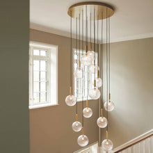 Load image into Gallery viewer, Miira Chandelier in living room.
