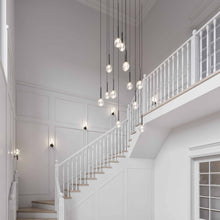 Load image into Gallery viewer, Miira Chandelier in living room.
