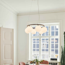 Load image into Gallery viewer, Miira Circular Chandelier in living room.
