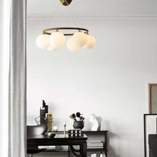 Load image into Gallery viewer, Miira Circular Chandelier in living room.
