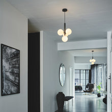 Load image into Gallery viewer, Miira Multi Pendant Light in living room.
