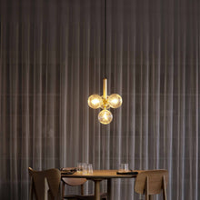 Load image into Gallery viewer, Miira Multi Pendant Light in living room.

