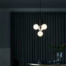Load image into Gallery viewer, Miira Multi Pendant Light in living room.
