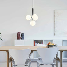 Load image into Gallery viewer, Miira Multi Pendant Light in living room.
