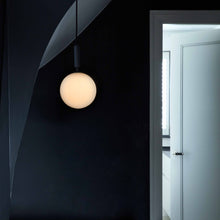 Load image into Gallery viewer, Miira Pendant Light in living room.

