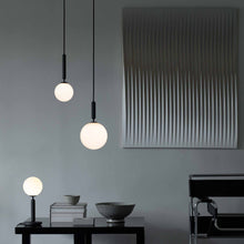 Load image into Gallery viewer, Miira Pendant Light in living room.
