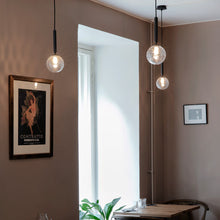 Load image into Gallery viewer, Miira Pendant Light in restaurant.
