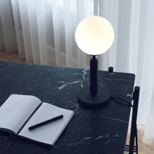 Load image into Gallery viewer, Miira Table Lamp in living room.
