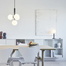 Load image into Gallery viewer, Miira Table Lamp in living room.
