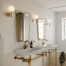 Load image into Gallery viewer, Miira Wall Light in bathroom.
