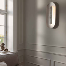 Load image into Gallery viewer, Sasi LED Wall Light in living room.
