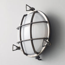 Load image into Gallery viewer, Brass Bulkhead Wall Light in Detail.
