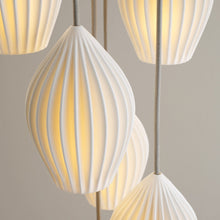 Load image into Gallery viewer, Fin Multi-Light Pendant Light in Detail.
