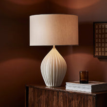 Load image into Gallery viewer, Fin Table Lamp in living room.

