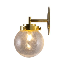 Load image into Gallery viewer, Globe Wall Light in Polished Brass/Seedy Clear.
